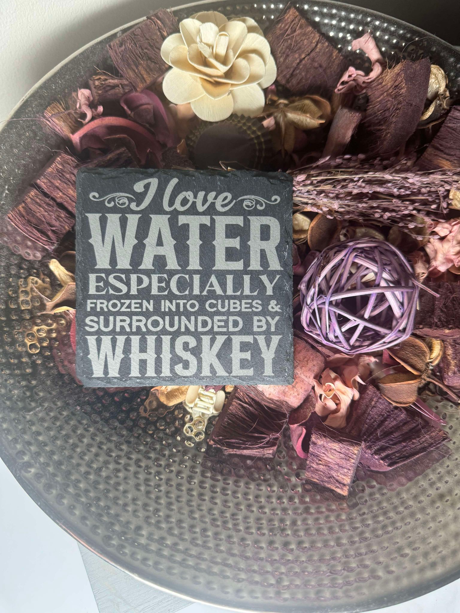 Slate coaster with funny alcohol quotes.