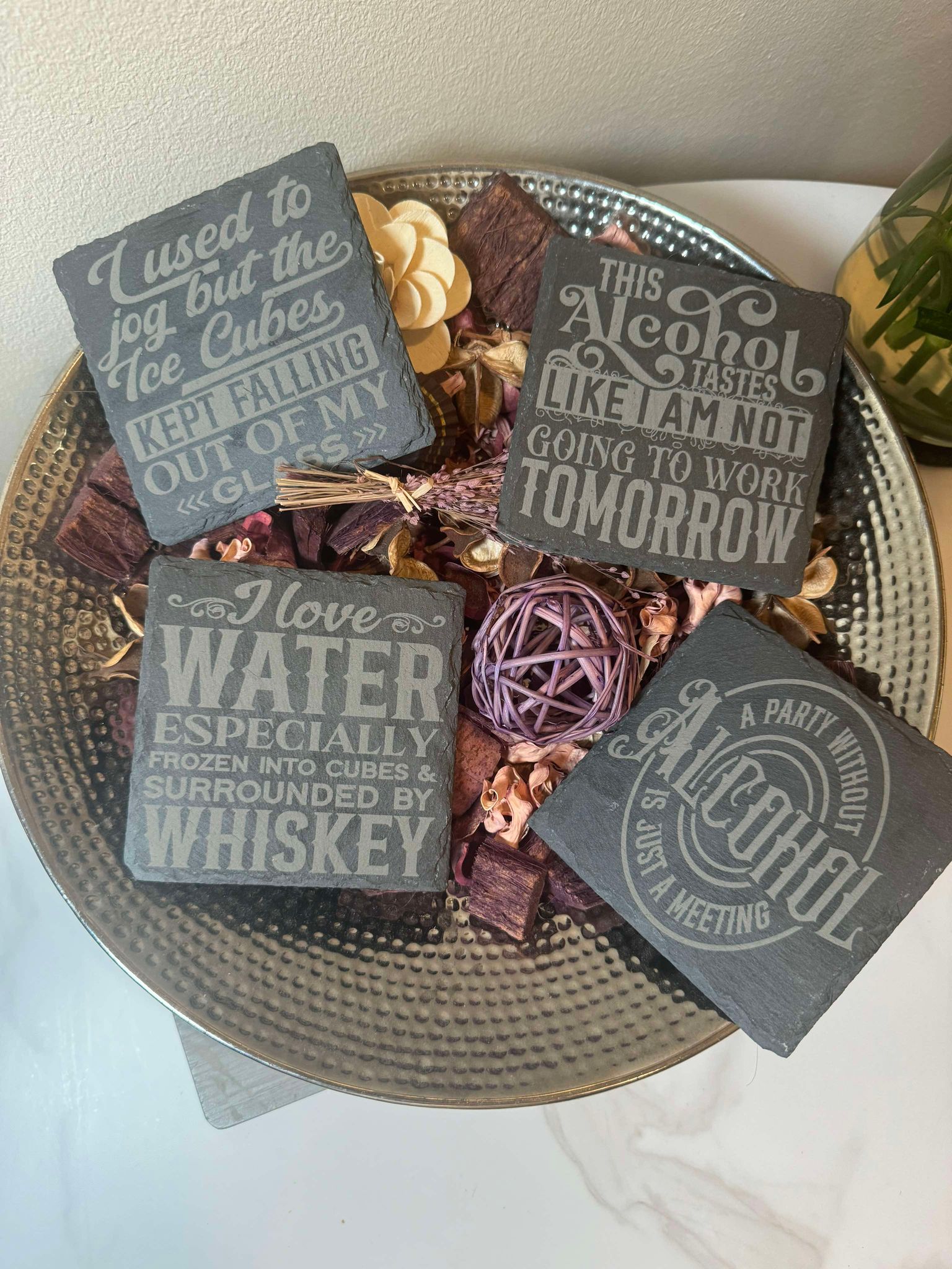 High-quality slate coasters for drinks.