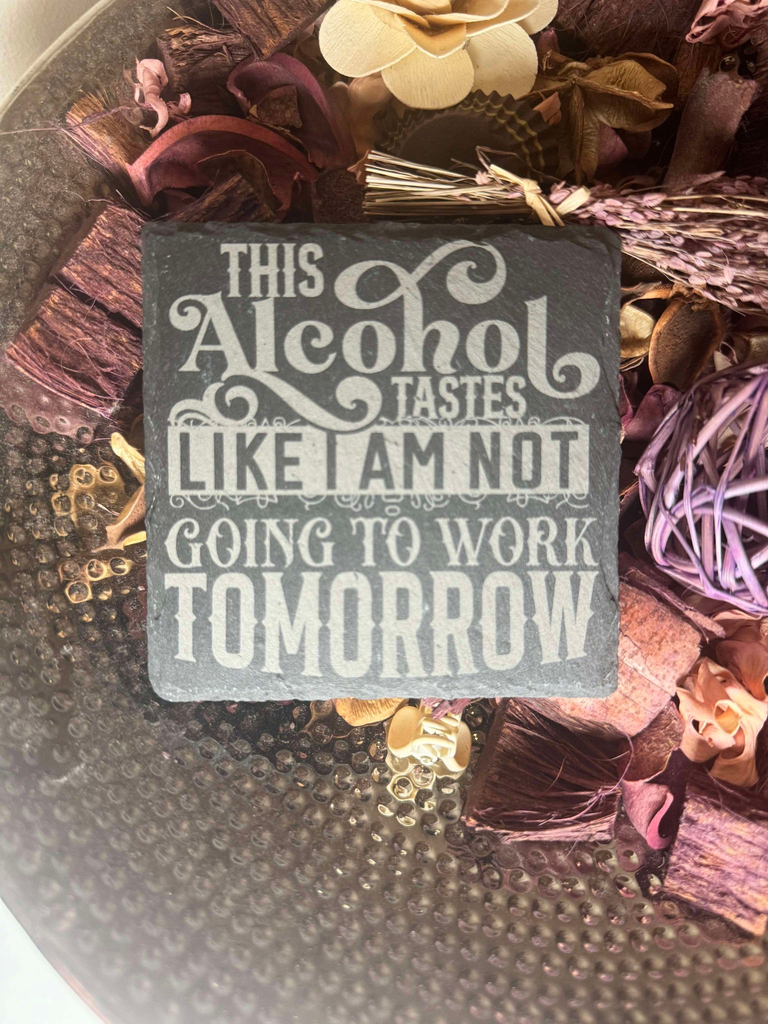 Slate coaster with funny alcohol quotes.